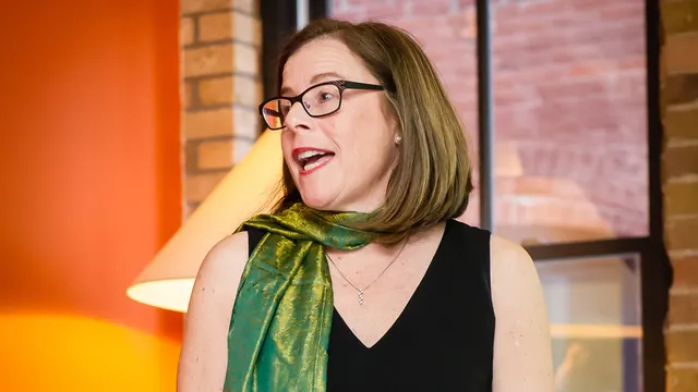 Audrey Miller speaking at an event